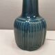 Elegant mid-century ceramic table lamp with an embossed pattern covered in mother-of-pearl glaze.
