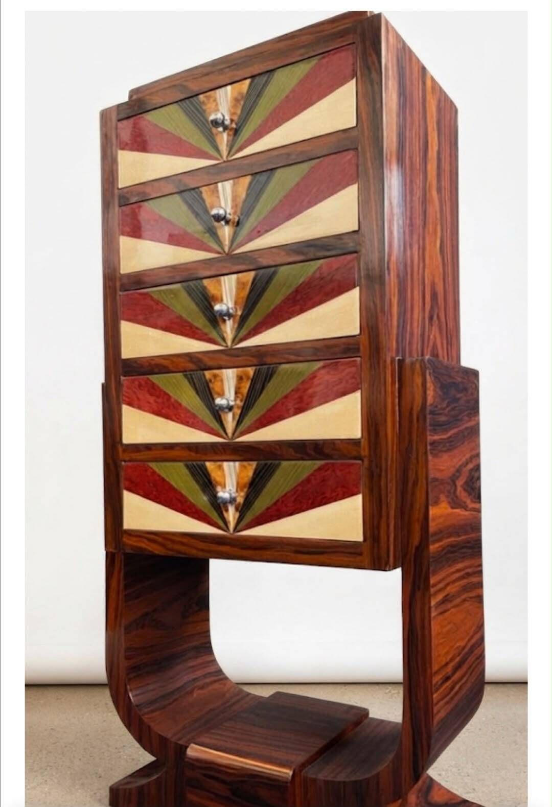 An Art Deco chest of drawers with five beech and rosewood drawers.