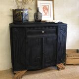 Matte black buffet and raw wood feet