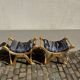 2 wooden footrests with blue cushions
