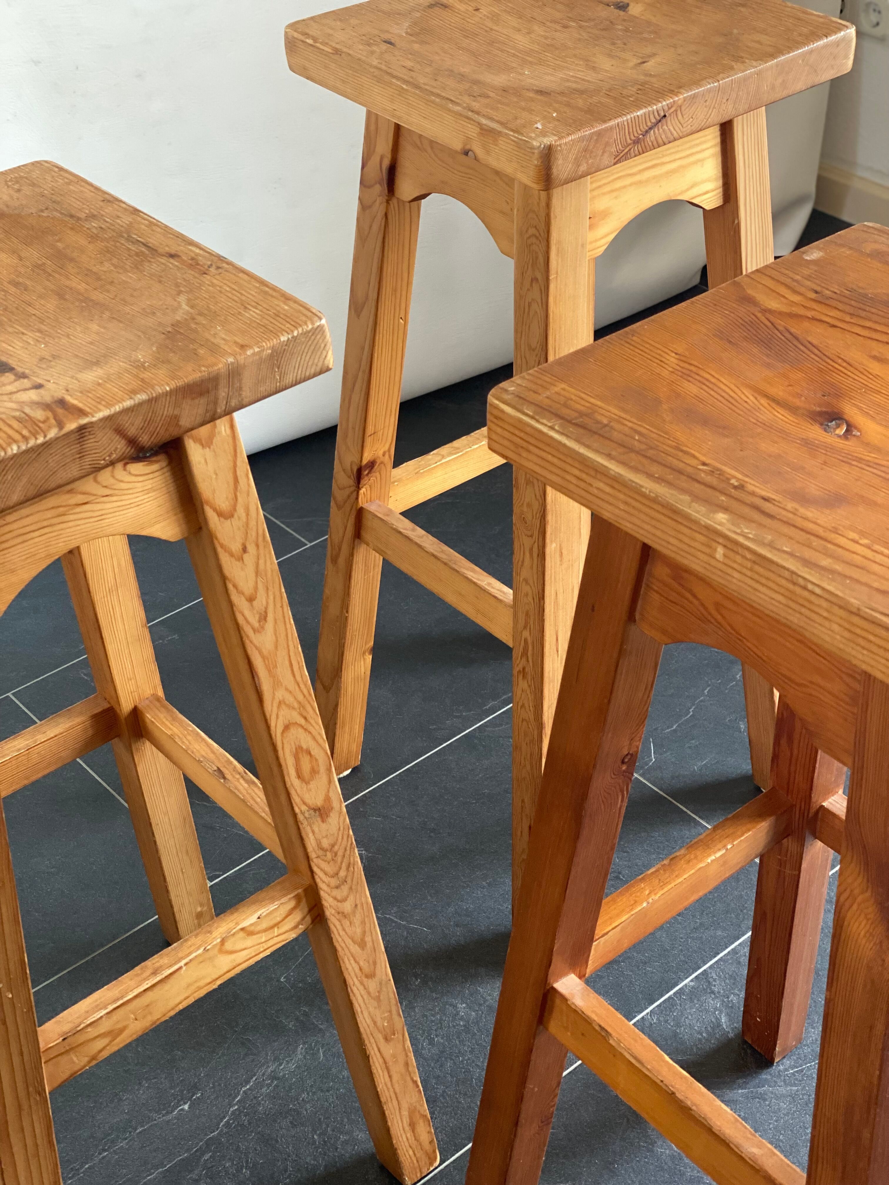 Trio of vintage pine wood bar stools