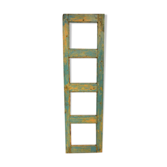 Blue mirror in old patinated teak wood