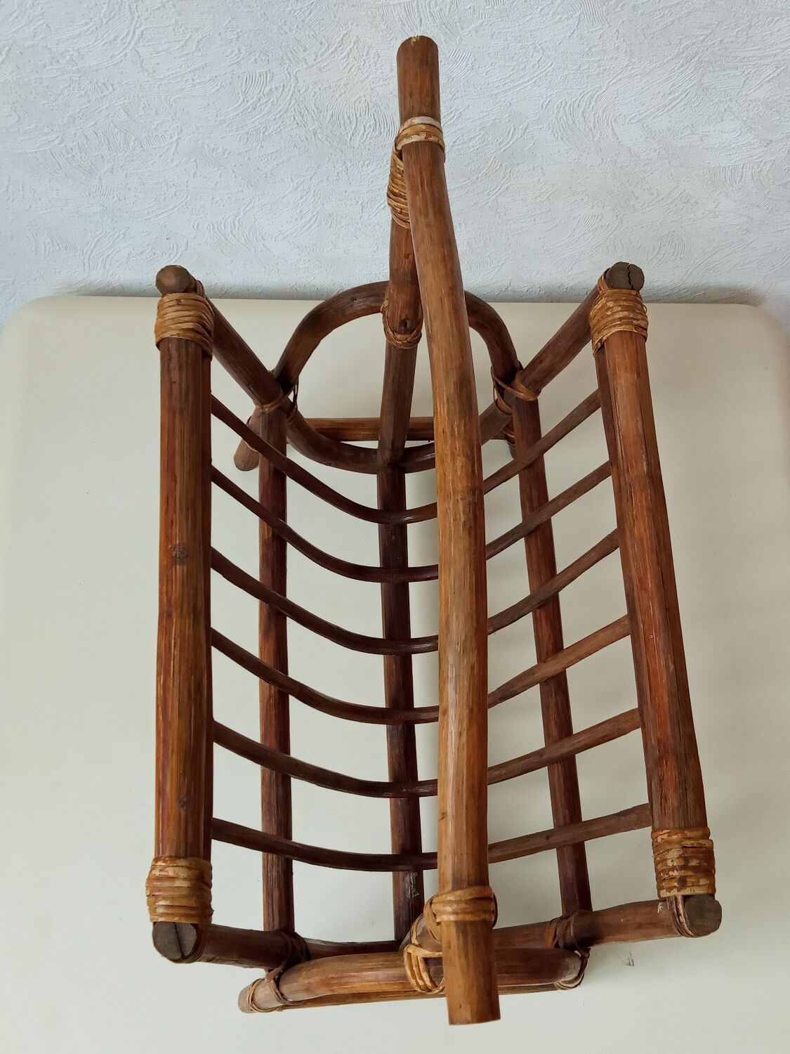 Vintage rattan magazine holder