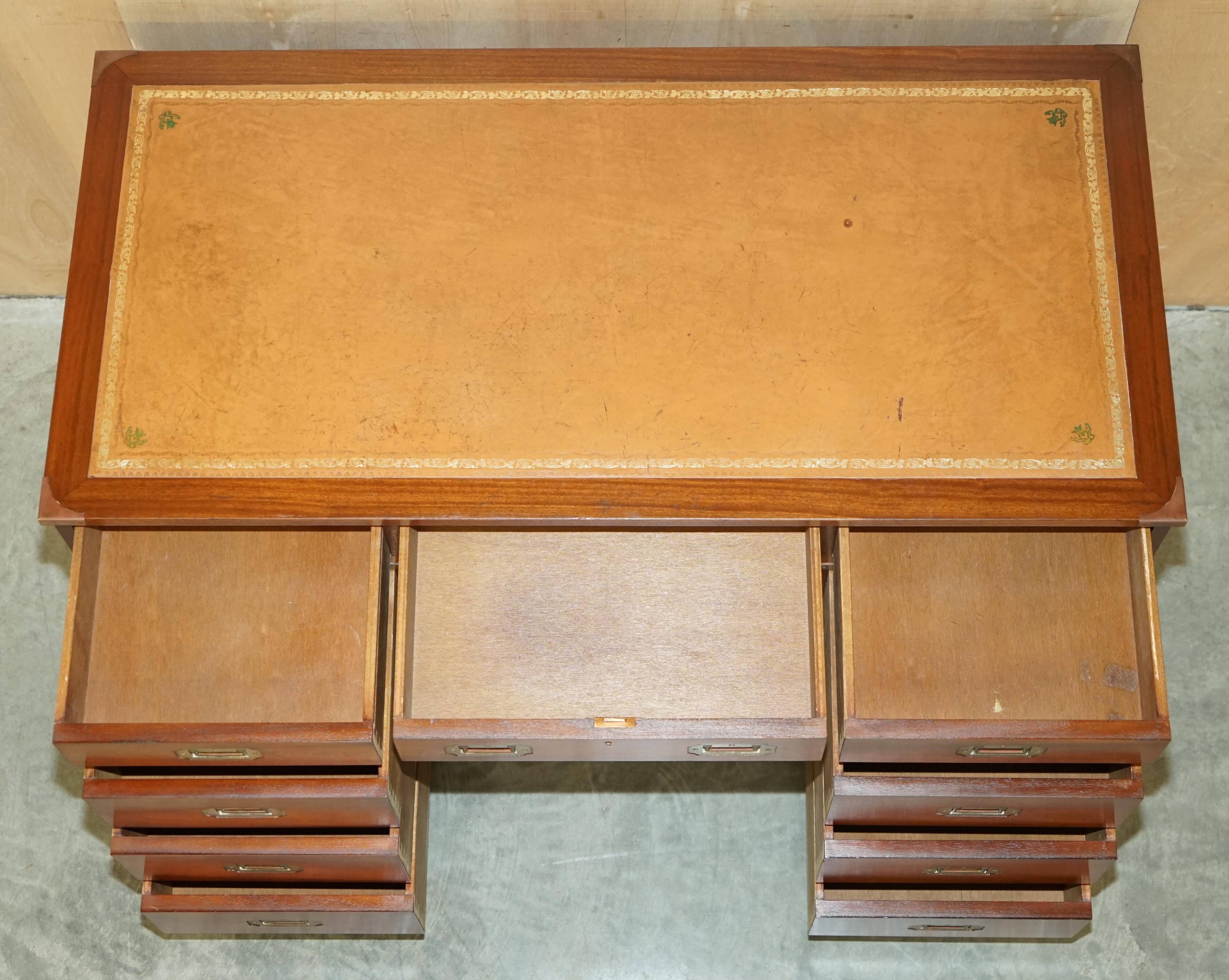 Vintage Harrods Kennedy desk in military campaign style with drawers.