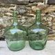 set of tinted glass demijohns