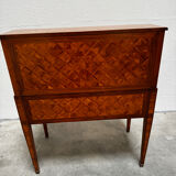 Cylinder desk with marquetry featuring a crosshatch design.
