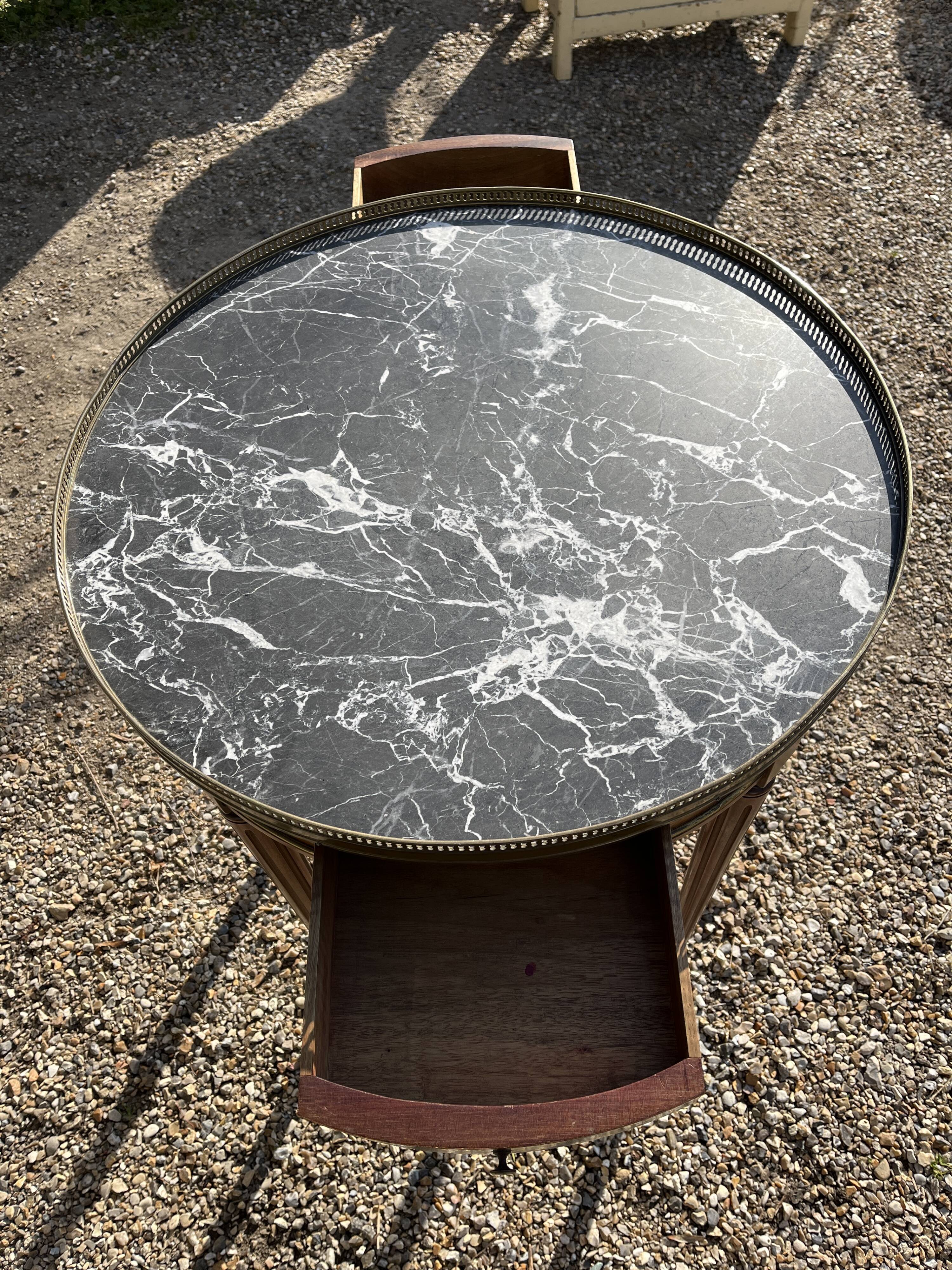 Mahogany hot water bottle table with brass net