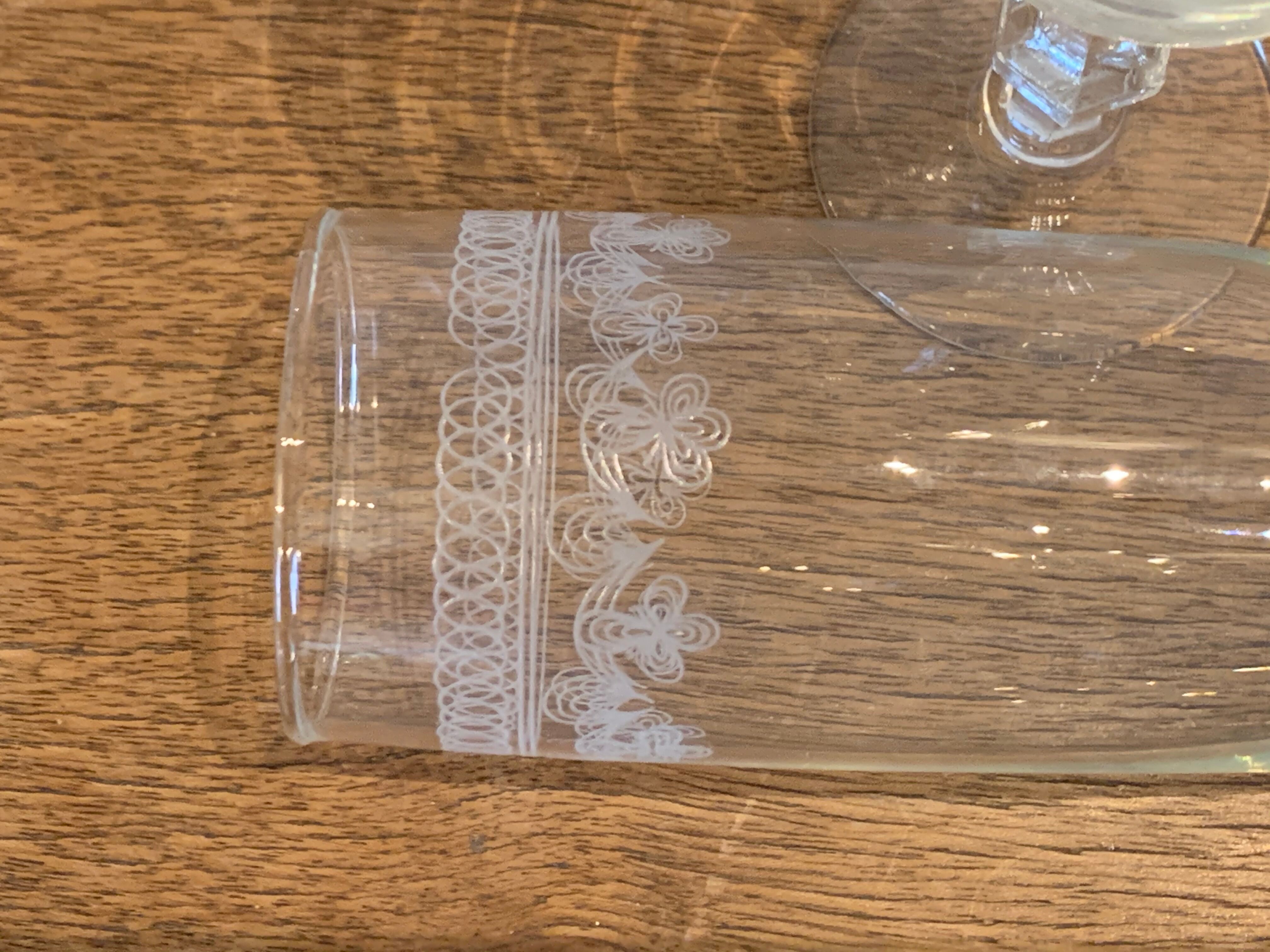 6 chiseled champagne flutes on vintage floral frieze pattern