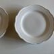Set of 7 Mougins plates in white enamelled clay with gadroons