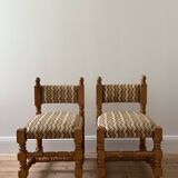 Pair of wooden chairs with herringbone fabric