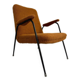 Vintage orange boucle armchair, French design from the 1950s.