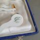 12 Limoges art porcelain knife rests in their case
