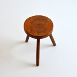 Old brutalist tripod stool in solid wood