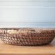 Old wicker basket, straw and bramble, woven basket, countryside, chalet, kitchen, interior decoration.