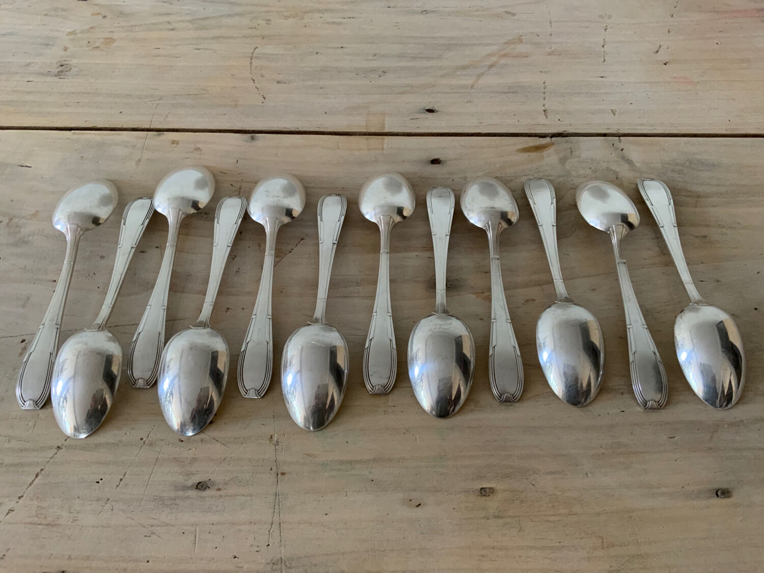 12 silver-plated spoons