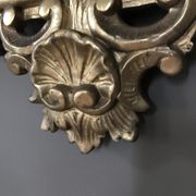 Miroir en bois sculpté doré d'époque régence 60x97cm