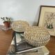 Pair of amber glass ceiling sconces with small vintage flowers.