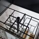 Vintage rotating bookcase for paperbacks in black lacquered metal, 58 cm