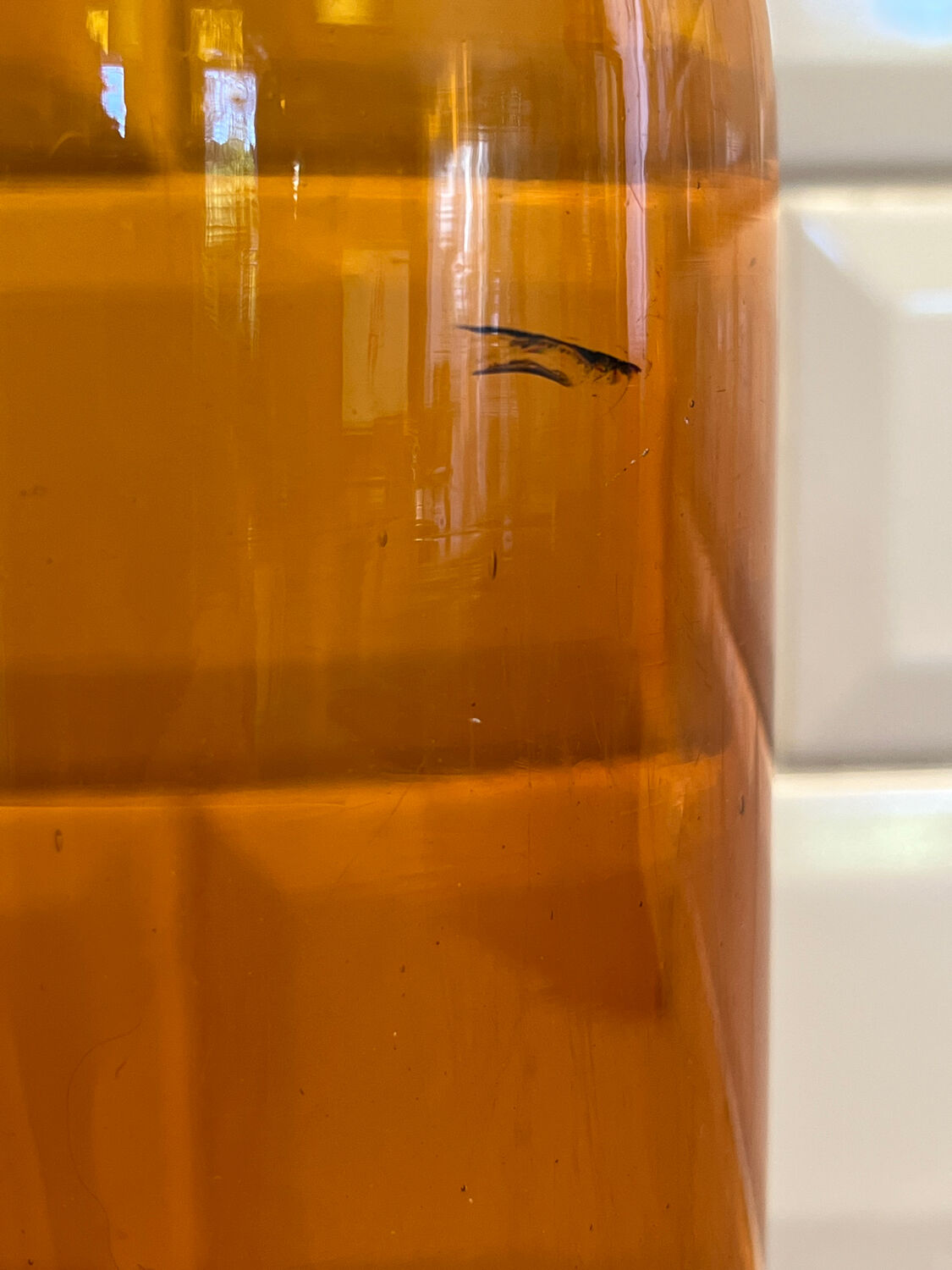 Amber glass bottle vase