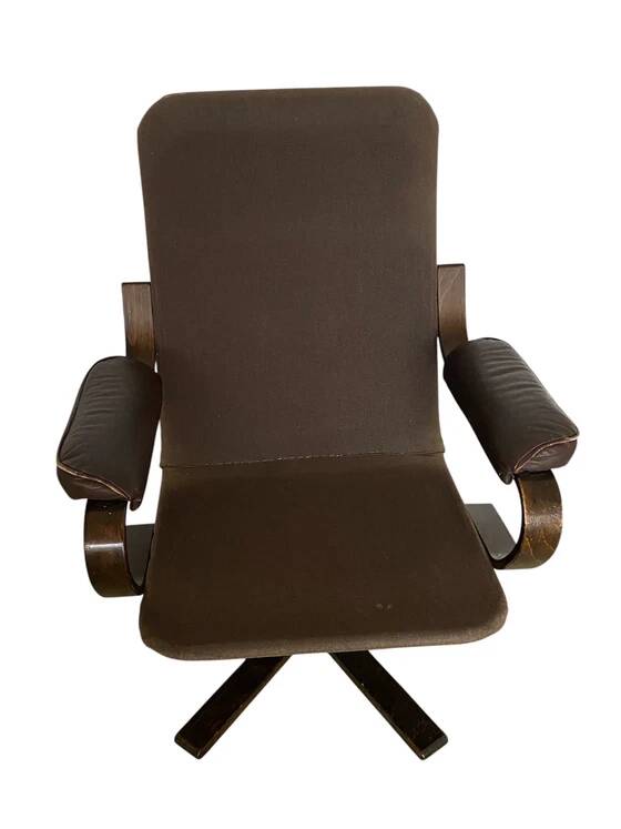 Scandinavian rocking and swivelling armchair – bent wood and leather