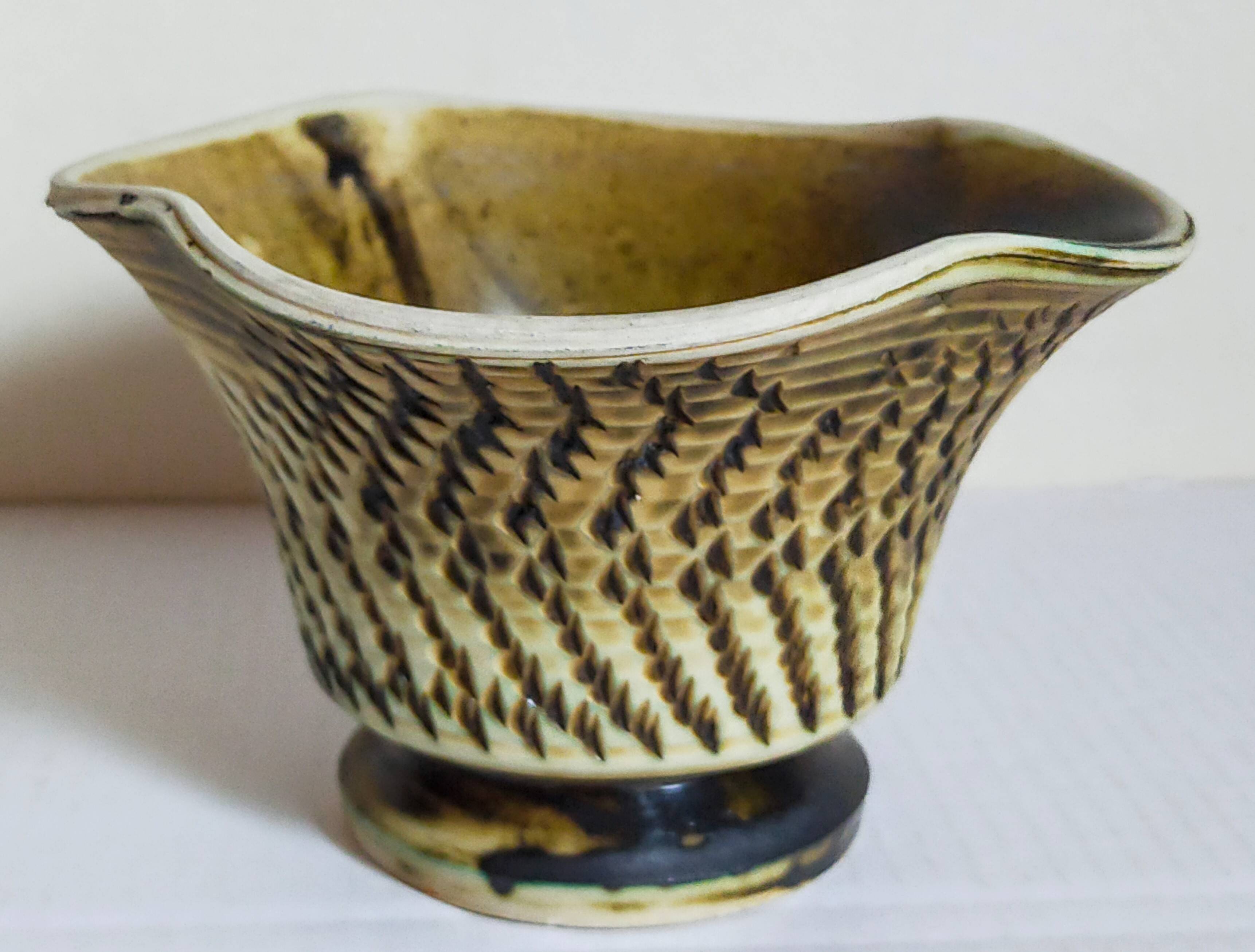 Ceramic planter with vintage scarifications from the 1950s