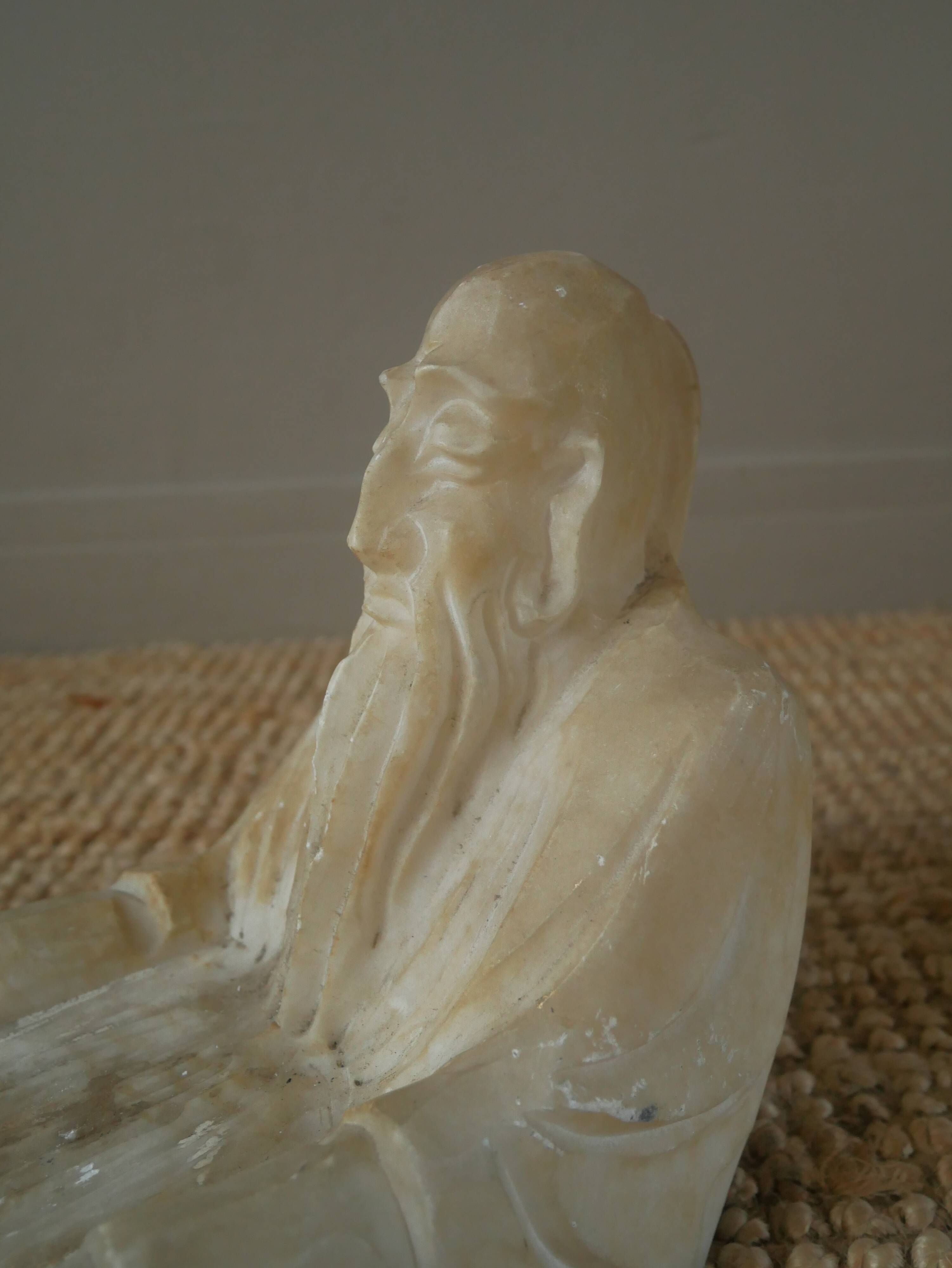 Alabaster sculpture empty pocket Asian decoration object handcrafted countryside seated man