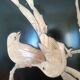 Panneau en bois laqué noir motifs d'oiseaux et de branches fleuries en ivoire et en nacre, fin XIX