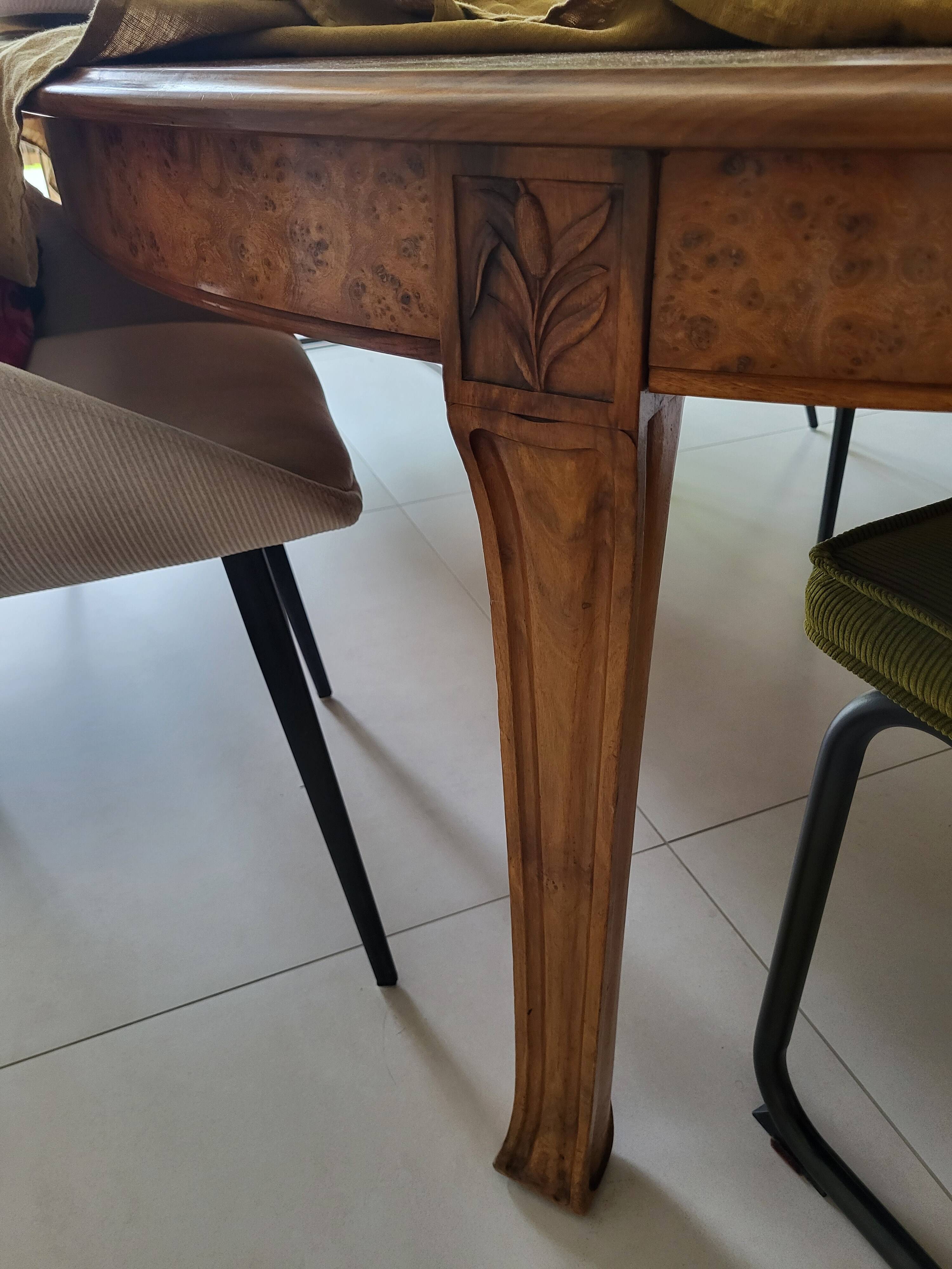 Table and 10 Art Nouveau style chairs.