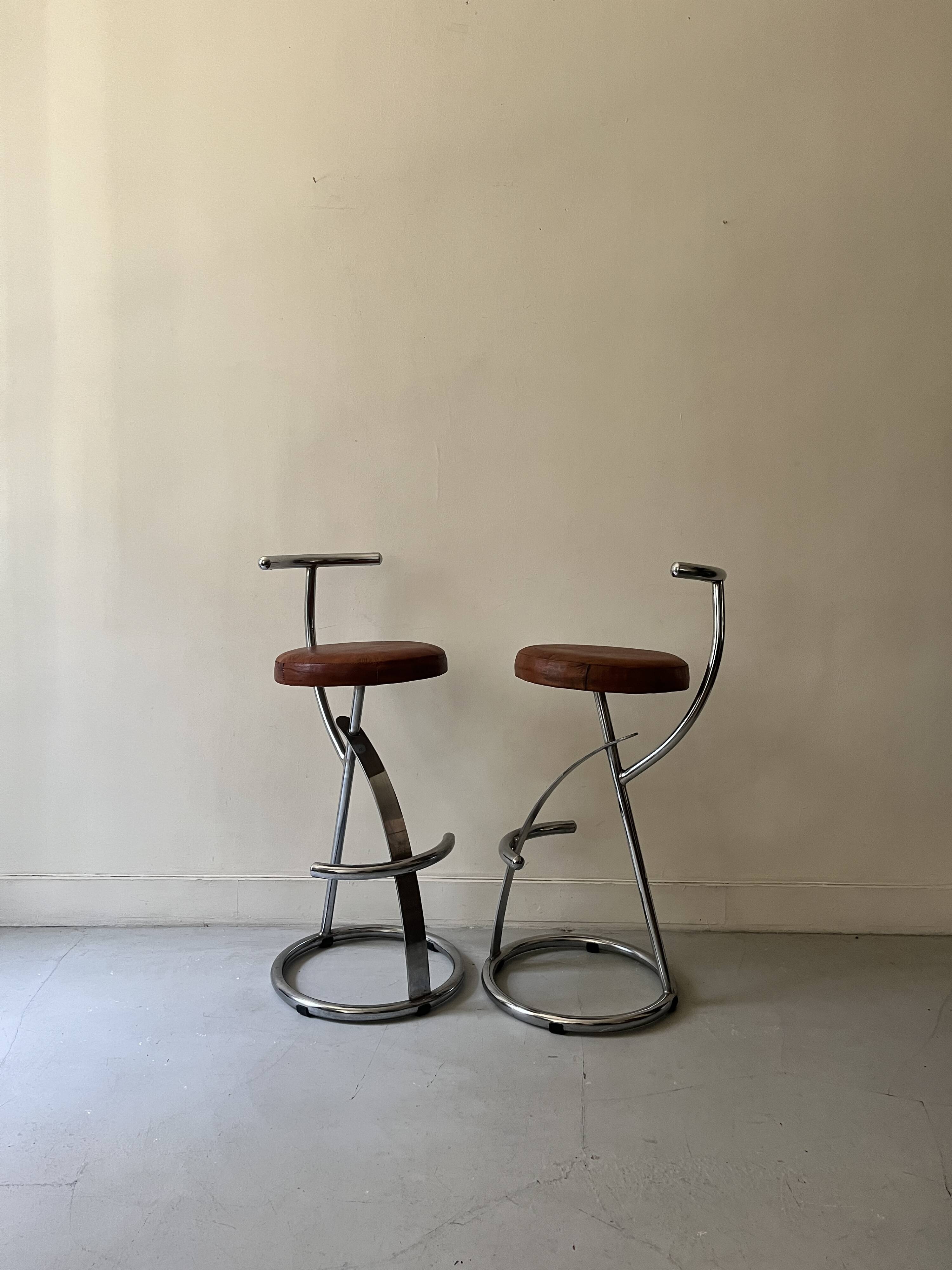 Bar stools in tubular chrome and tan leather, 1970s