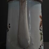 Enamelled sheet metal pourer decorated with black berries early twentieth century