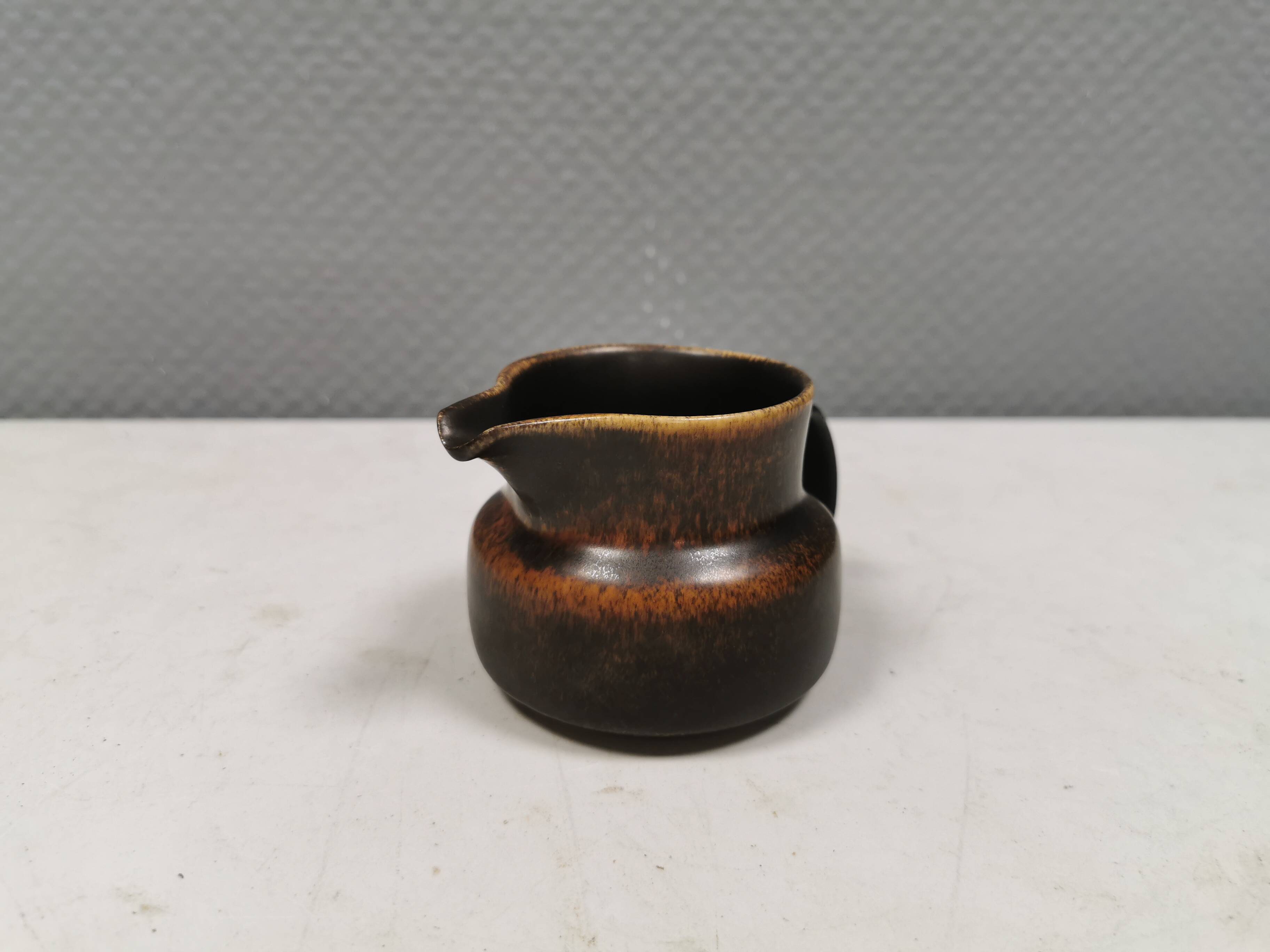 Very nice cream jug in hare fur glaze, Danish and from the 1970-80s.