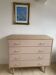 Pink tapered leg chest of drawers