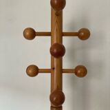 Varnished pine coat rack
