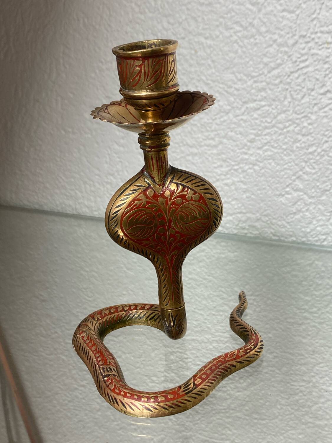Chiseled brass cobra candlestick