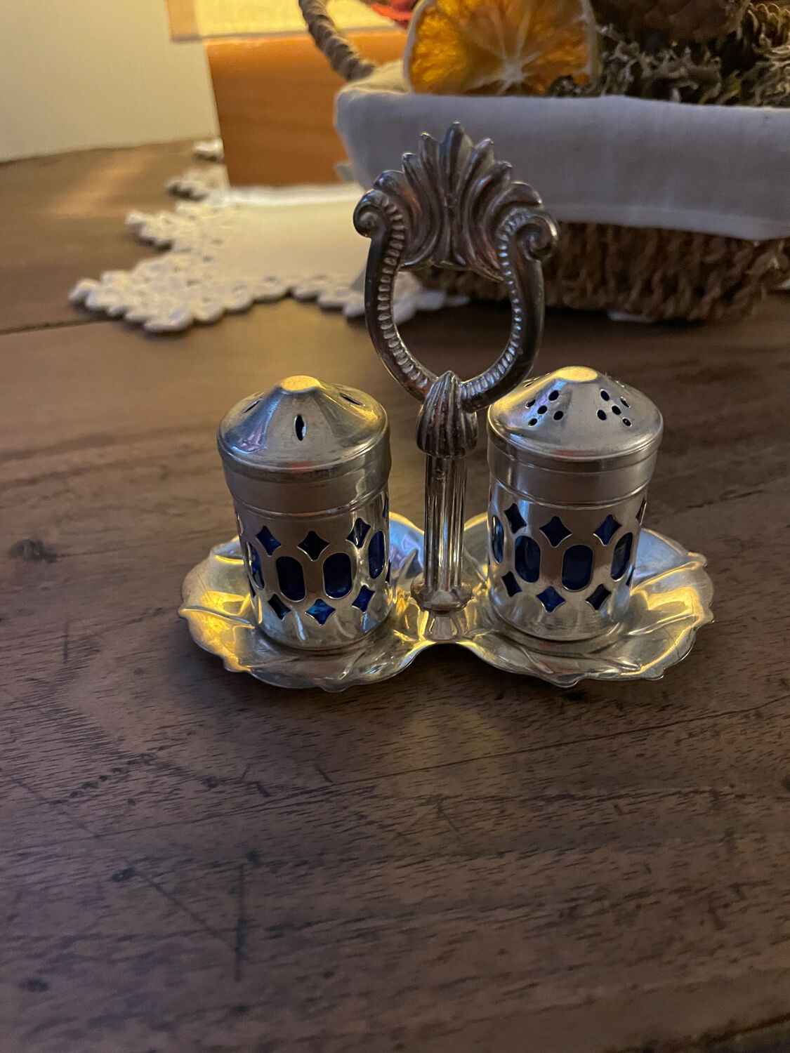Vintage pepper shaker duo