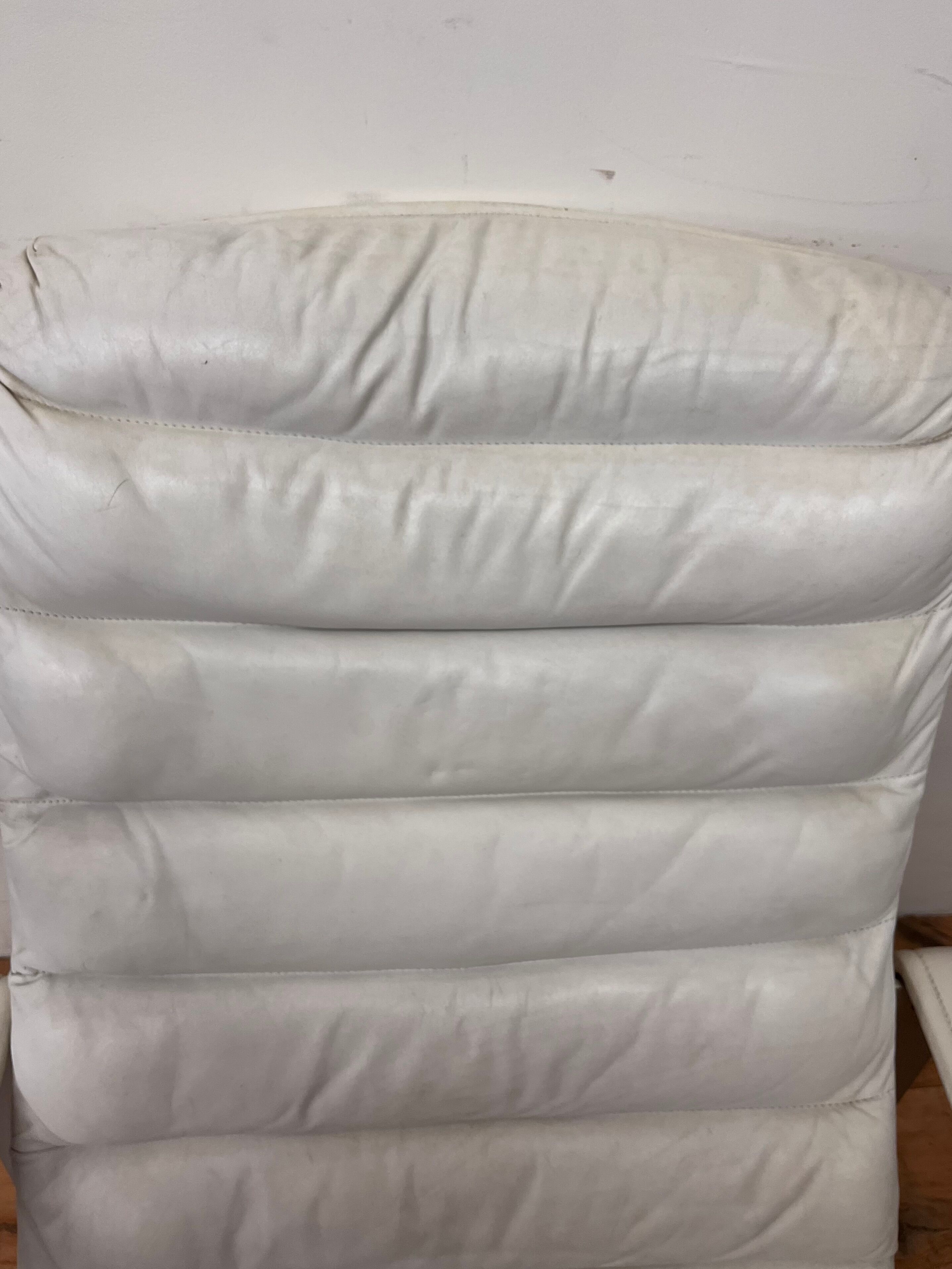 Pulkka armchair by Ilmaria Lappalainen and its ottoman