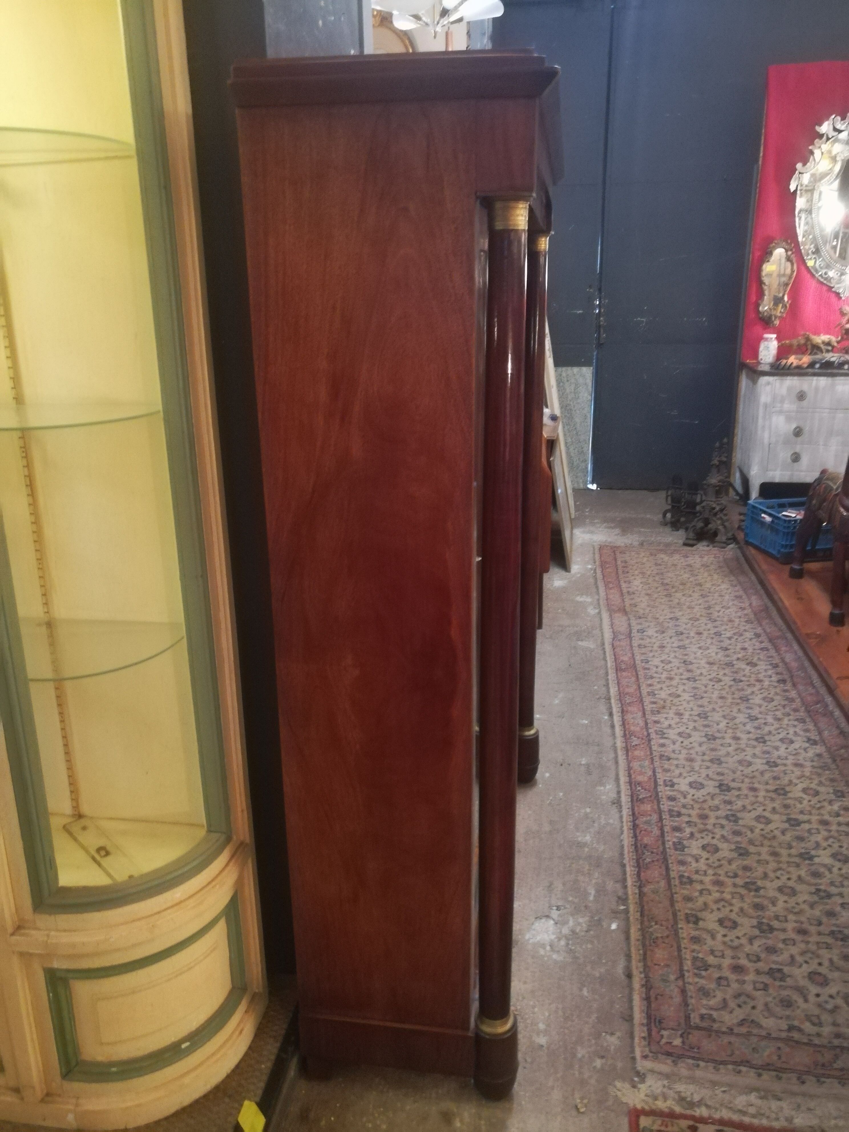 Empire style library in mahogany and bronze