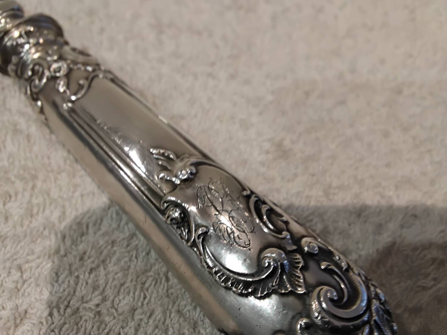 Fish serving fork with 950 silver handle, rococo cherub design