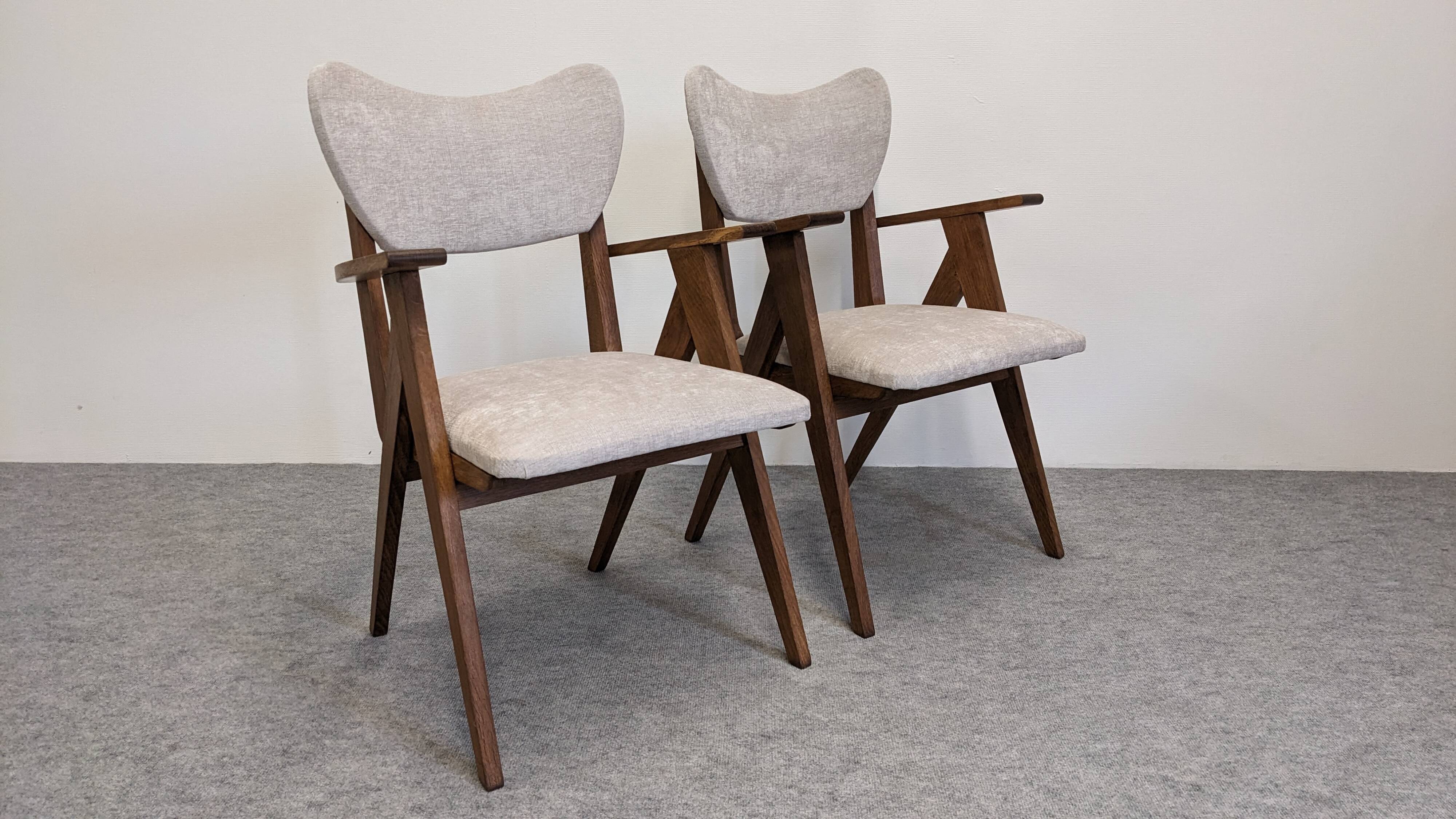 Pair of Scandinavian bridge armchairs in teak, Denmark circa 1950.