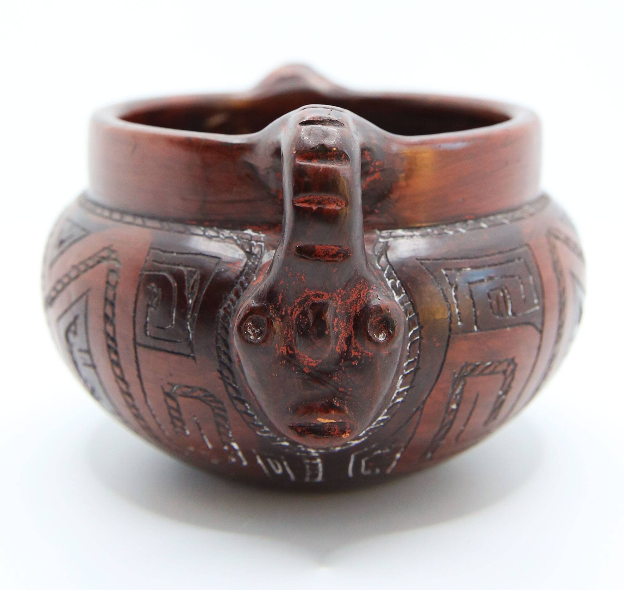 Ball vase with anthropomorphic handles signed by marivaldo Brazil