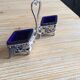 Salt shaker /pepper shaker and accessories in silver metal and blue glass compartment