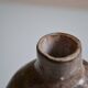 Ceramic bottle vase with a fish signature to be identified.
