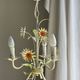 Small vintage cream metal flower chandelier with orange flowers and 3 arms.