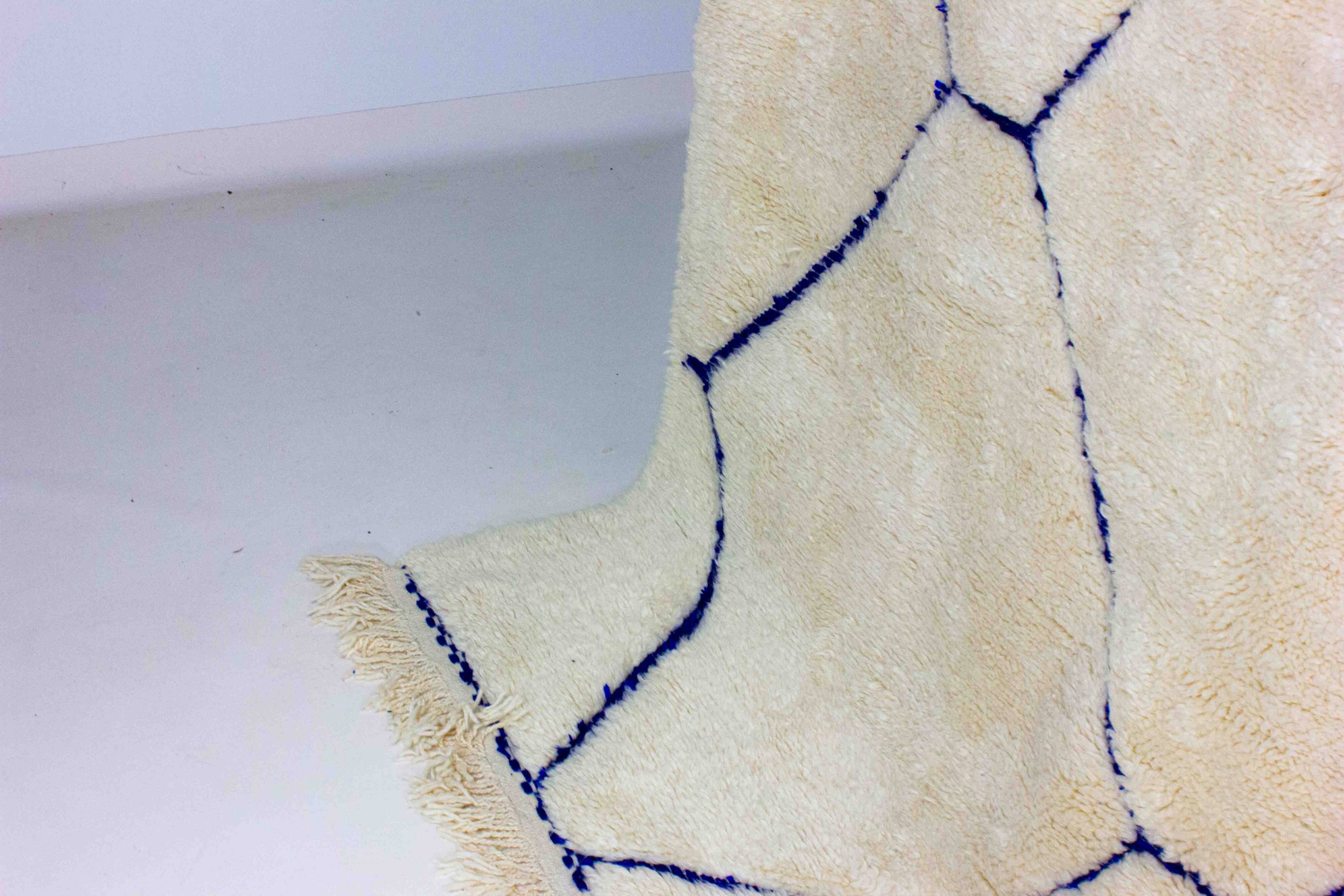 Vintage berber rug in ivory and blue wool