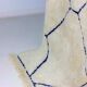 Vintage berber rug in ivory and blue wool
