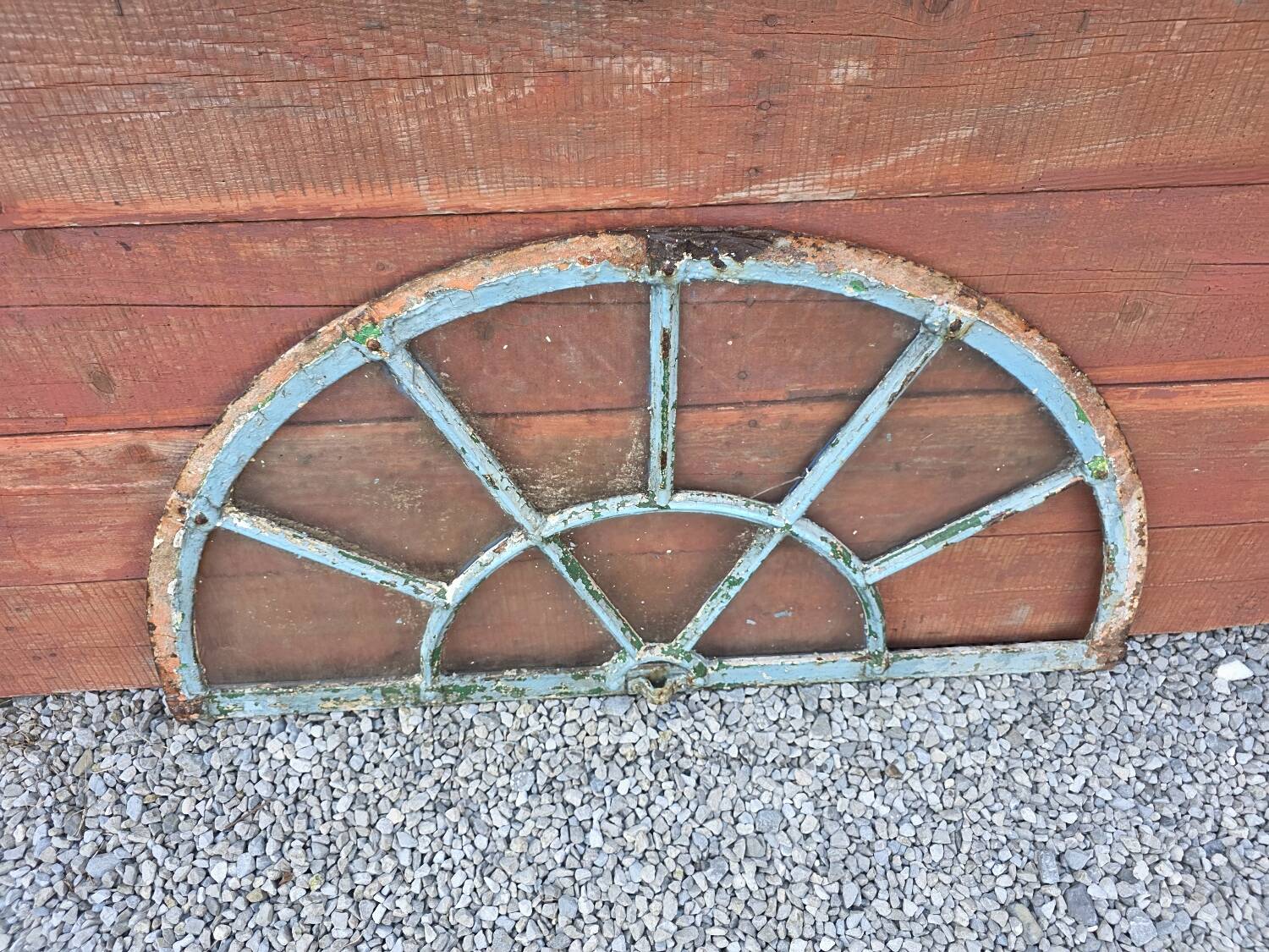 Old wrought iron full riveted gates from the 19th century.