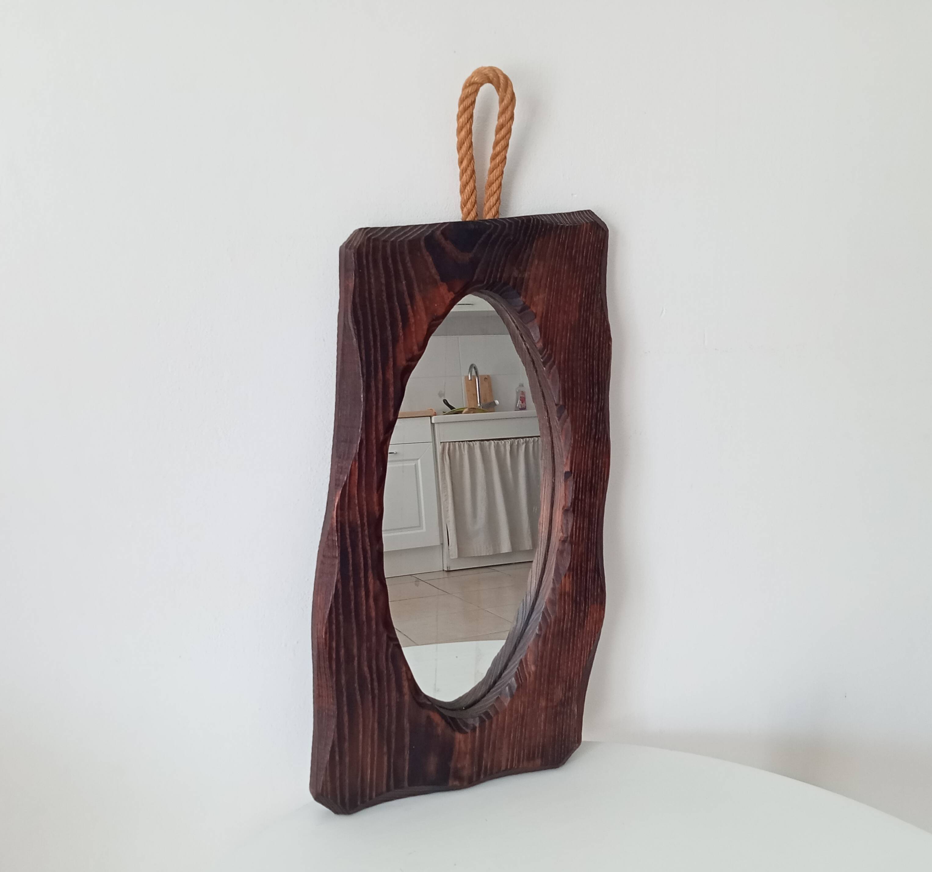Brutalist antique mirror in solid wood from the 1950s/60s.