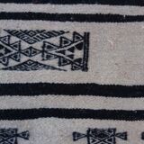 Beige and black handmade carpet, 110x55cm
