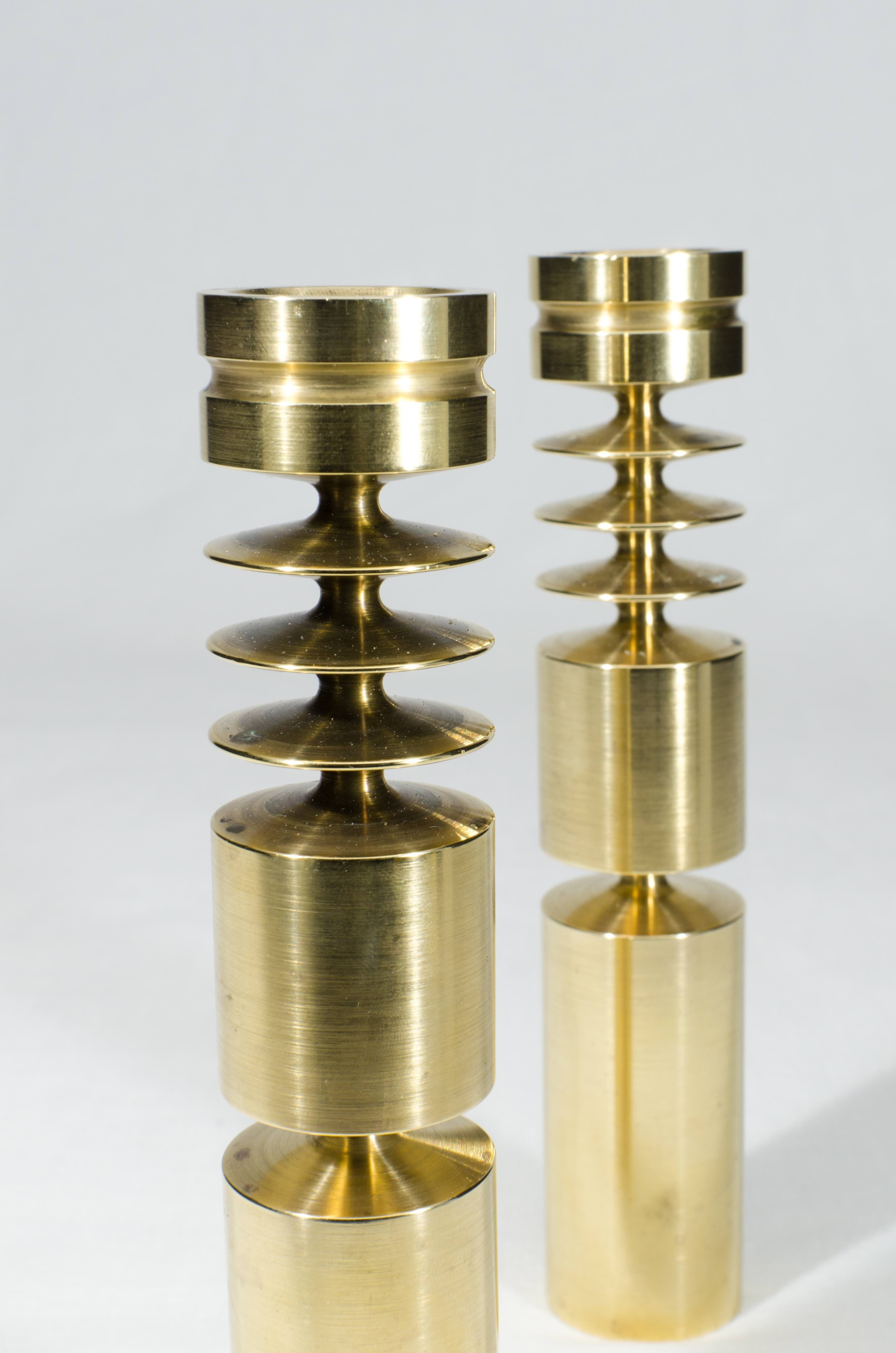 pair of scandinavian brass candlesticks  circa 1960