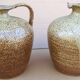Pair of small antique stoneware oil jars